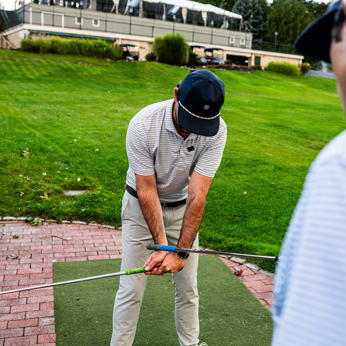 Golfer wearing the Core Energy belt